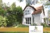 Fassade.png - IMMOBRA: Attraktives Einfamilienhaus mit Doppelgarage am Seehof