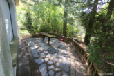Terrasse seitlich - Natur, Ruhe und Freiheit – Ihr Platz am Wasser mit eigenem Steg und Seeanteil wartet