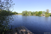 Blick See links - Natur, Ruhe und Freiheit – Ihr Platz am Wasser mit eigenem Steg und Seeanteil wartet