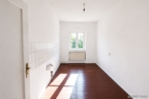 Küche - Gepflegtes Mehrfamilienhaus mit 7 Wohneinheiten, Garagen und zusätzlichem Baugrundstück