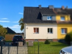 Titelbild - Vermietete Doppelhaushälfte auf eigener Scholle – Kapitalanlage in Brandenburg
