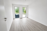 Arbeitszimmer - Moderne Neubauwohnung mit Terrasse, Balkon, zwei Bädern und Tiefgarage