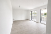 Wohn- und Küchenbereich - Moderne Neubauwohnung mit Terrasse, Balkon, zwei Bädern und Tiefgarage